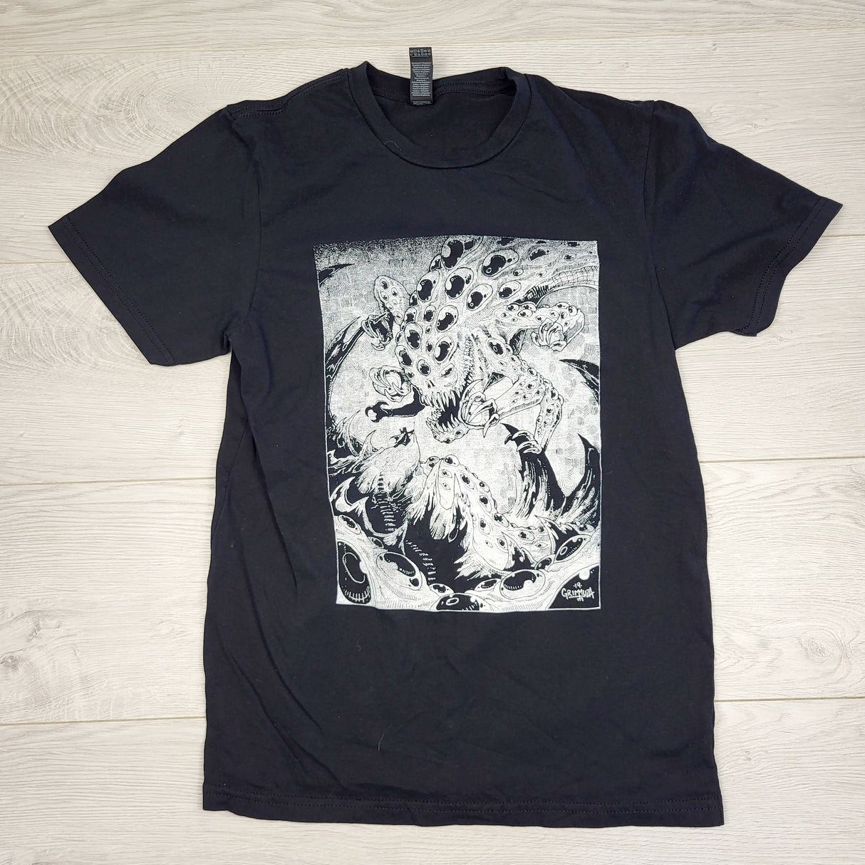 MFAIR2 - Locally made Angela Grimmuza designed t-shirt. ADULT small 🍁
