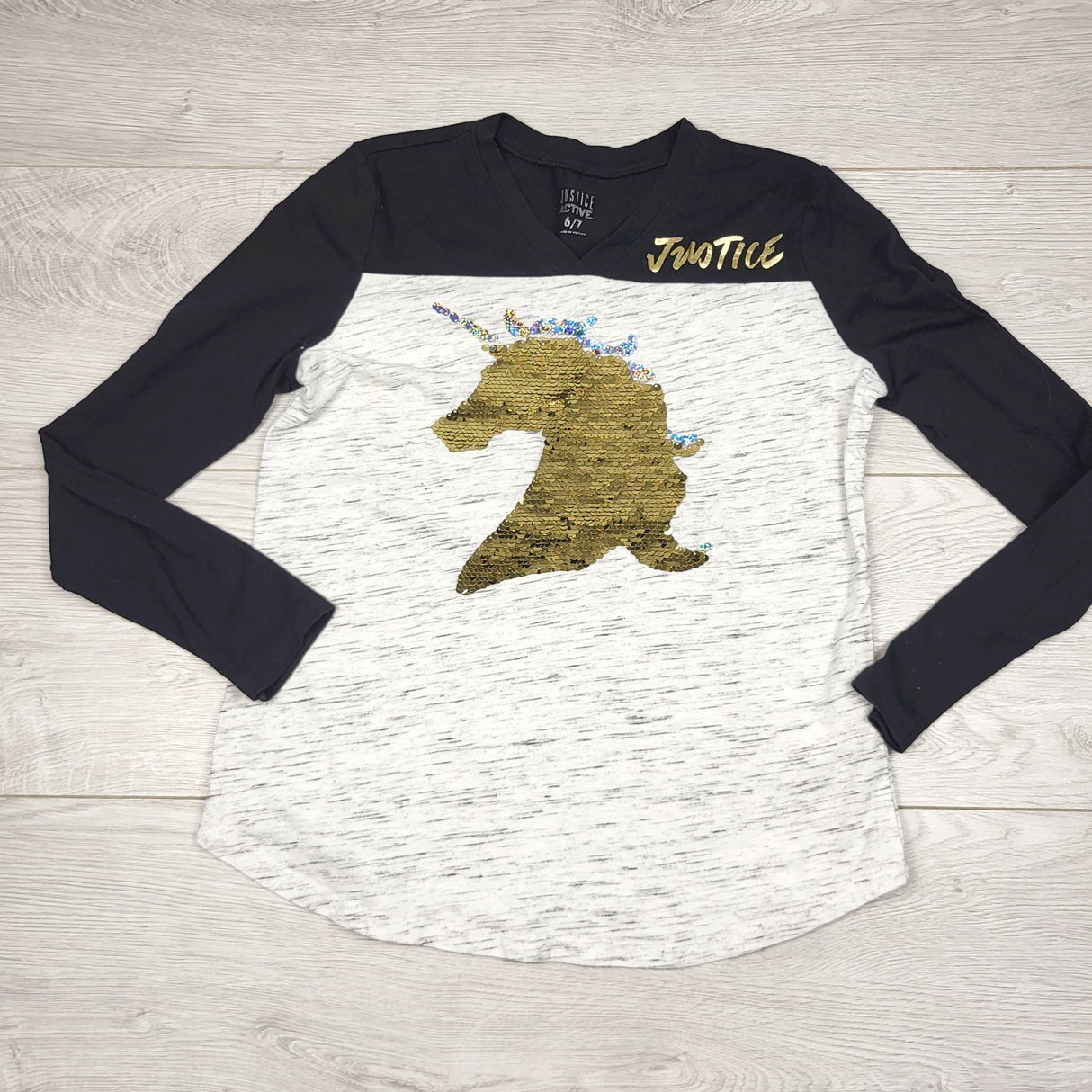 OAG2 - Justice black and grey long sleeved top with sequin unicorn. Size 6/7