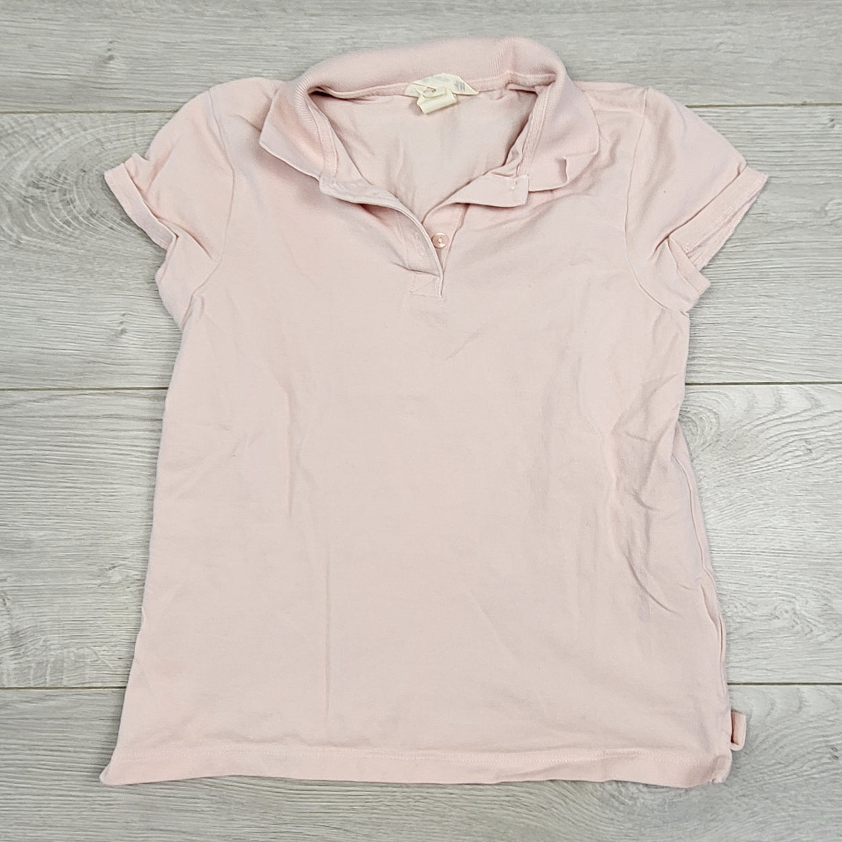SHRSS22 - H and M pink polo shirt. Size 8-10 years