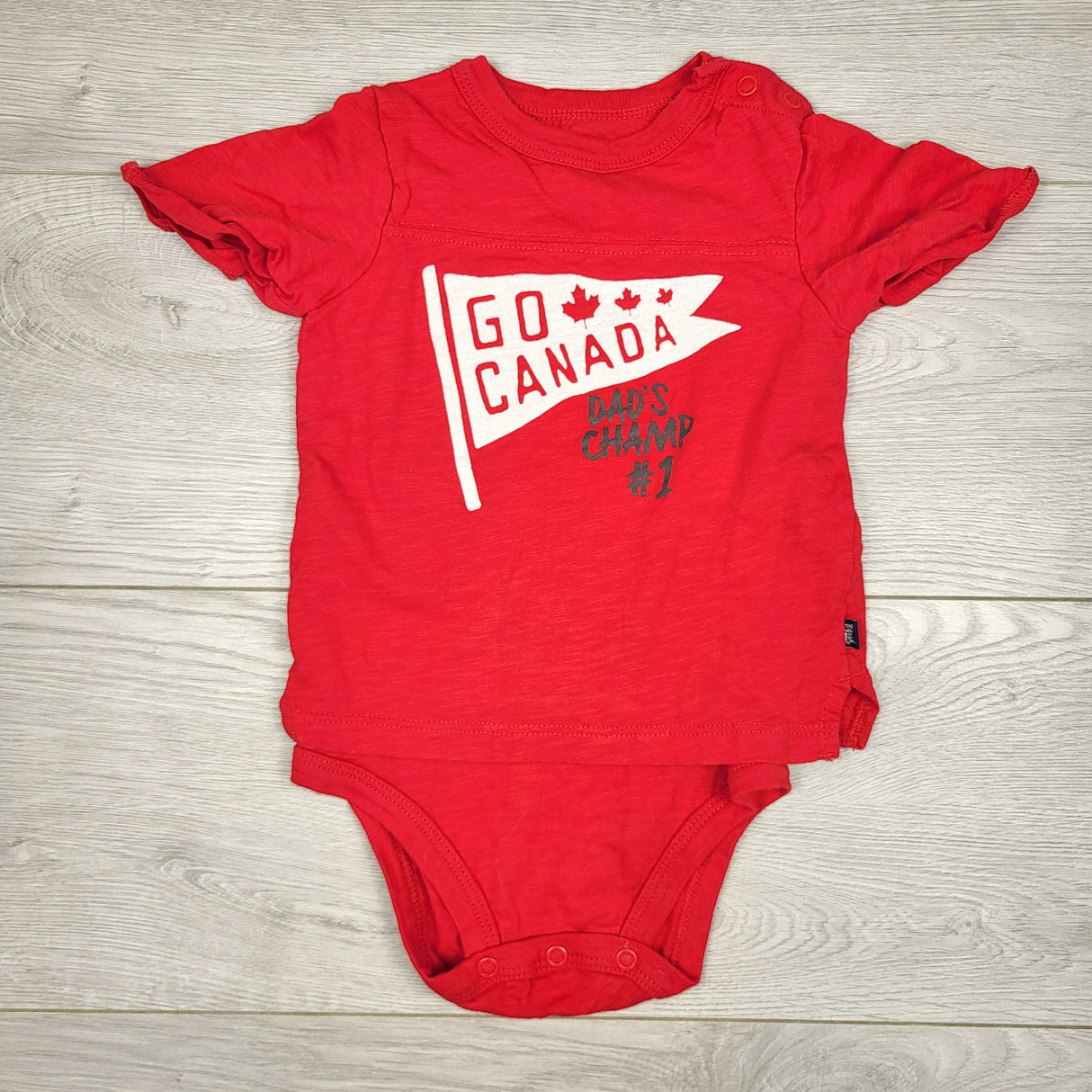 VKBL3 - Baby B'gosh red shirted "Go Canada" bodysuit. Size 12 months