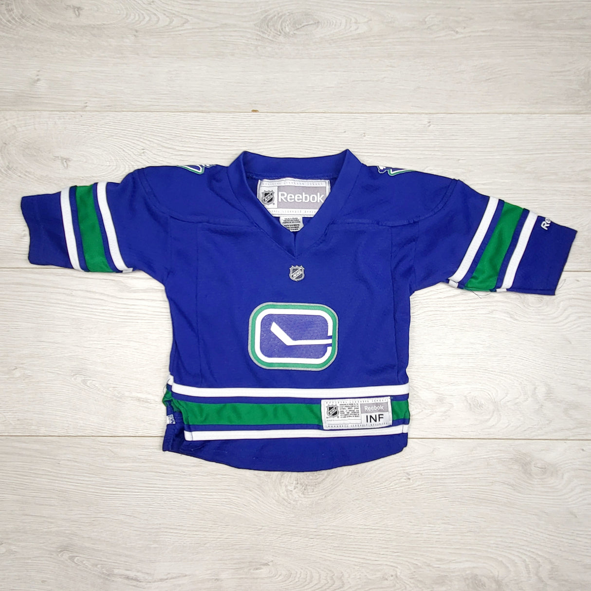 SPLT1 - Reebook Vancouver Canucks jersey shirt. Size 12-24 months
