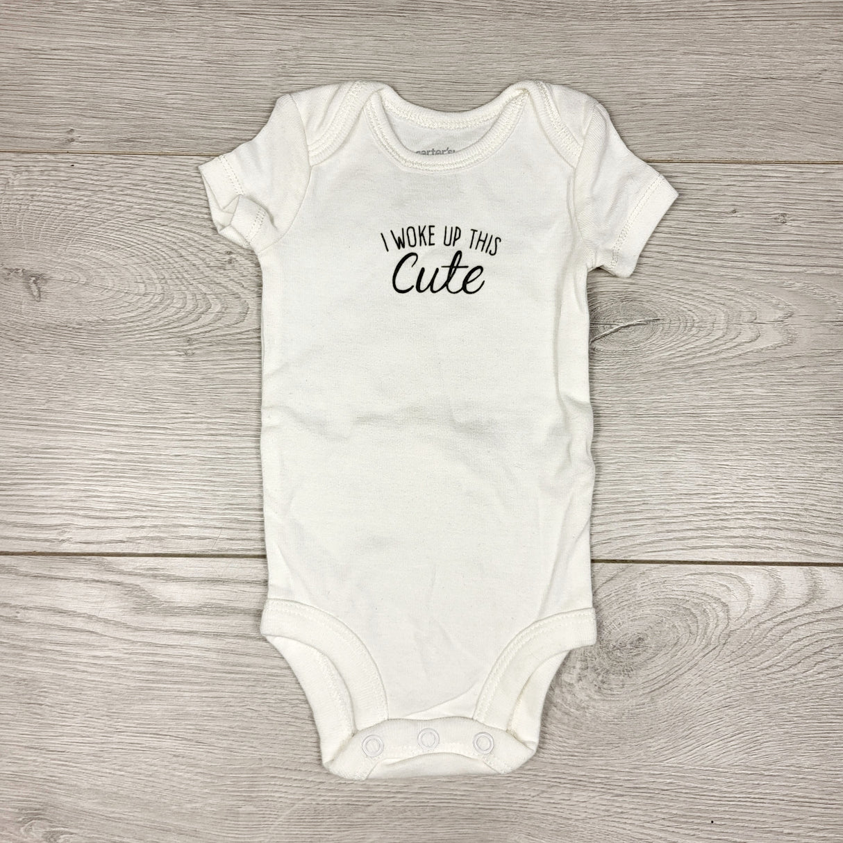 CHSP33 - Carters white "I Woke Up This Cute" bodysuit. Newborn size