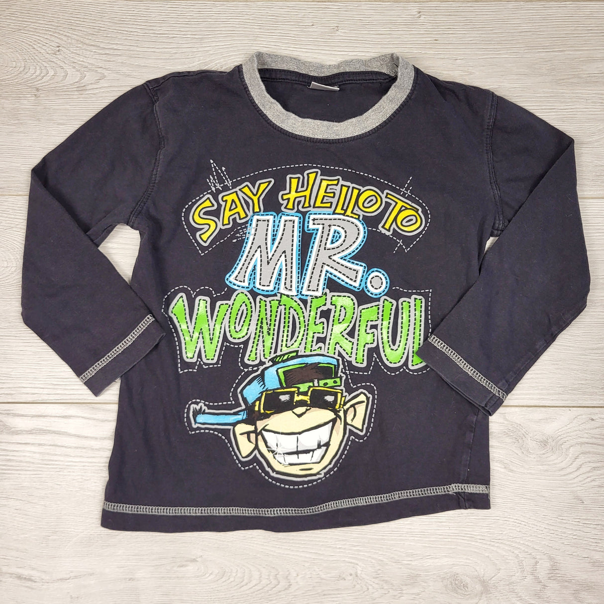 KARE11 - Cherokee dark grey "Mr. Wonderful" long sleeved top. Size 6