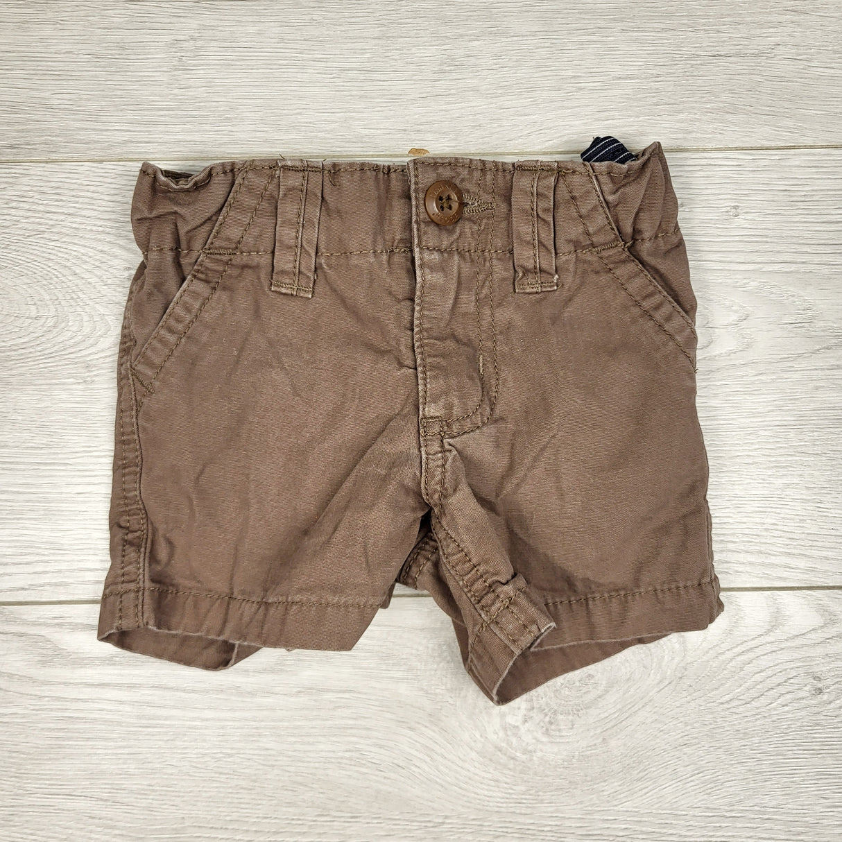 KARE11 - Oshkosh tan twill shorts. Size 6 months