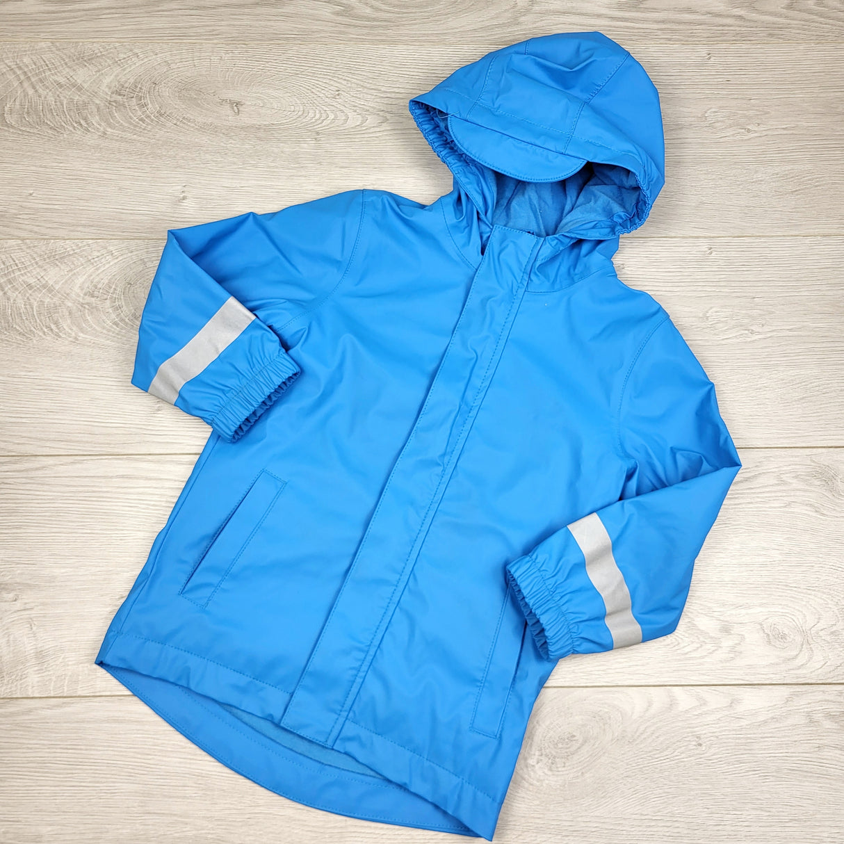 KMIL1 - Cat and Jack blue jersey lined rain coat. Size 3T