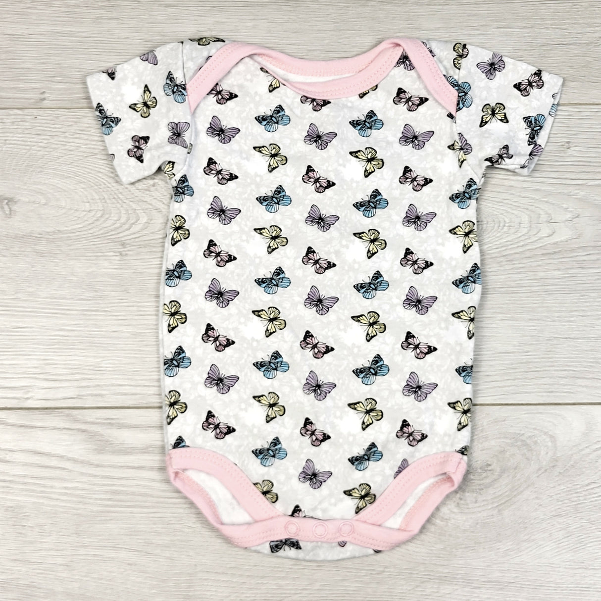 RBEN5 - Necessities grey bodysuit with butterflies. Size 0-3 months