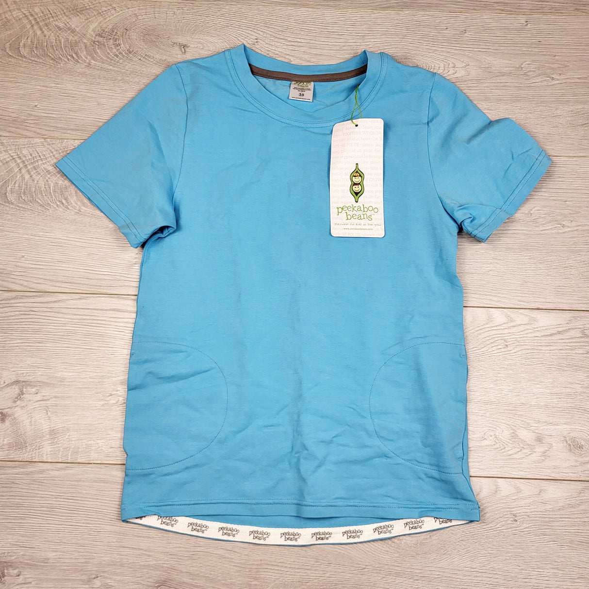 MHL2 - NEW - Peekaboo Beans blue t-shirt. Size 10