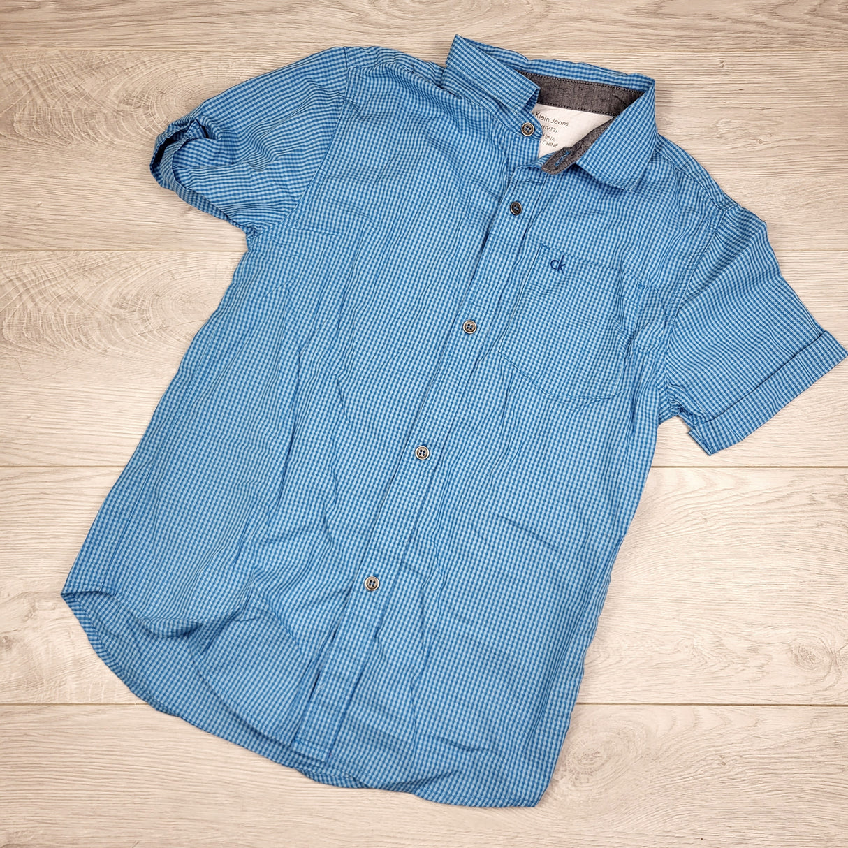 MHL2 - Calvin Klein blue plaid button down shirt. Size 10/12
