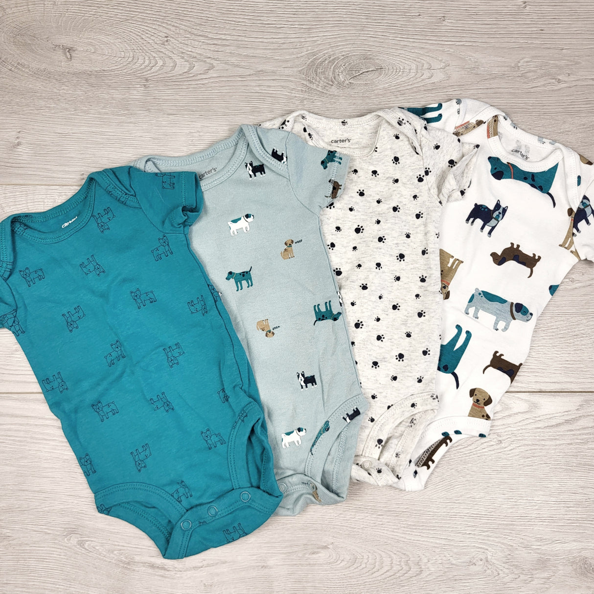 STFT1 - Carters 4pc bodysuit set with dogs. Size 3 months