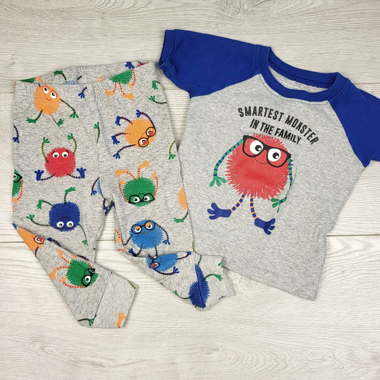 STFT1 - Children's Place grey and blue 2pc cotton PJs with monsters. Size 6-9 months