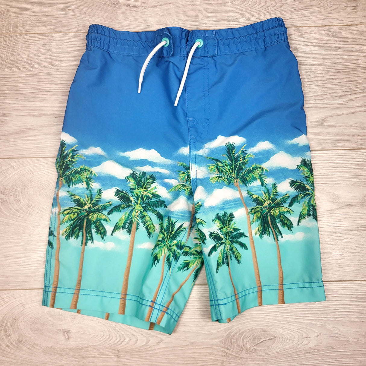 PS02 - Old Navy swim shorts with palm trees. Size 10/12