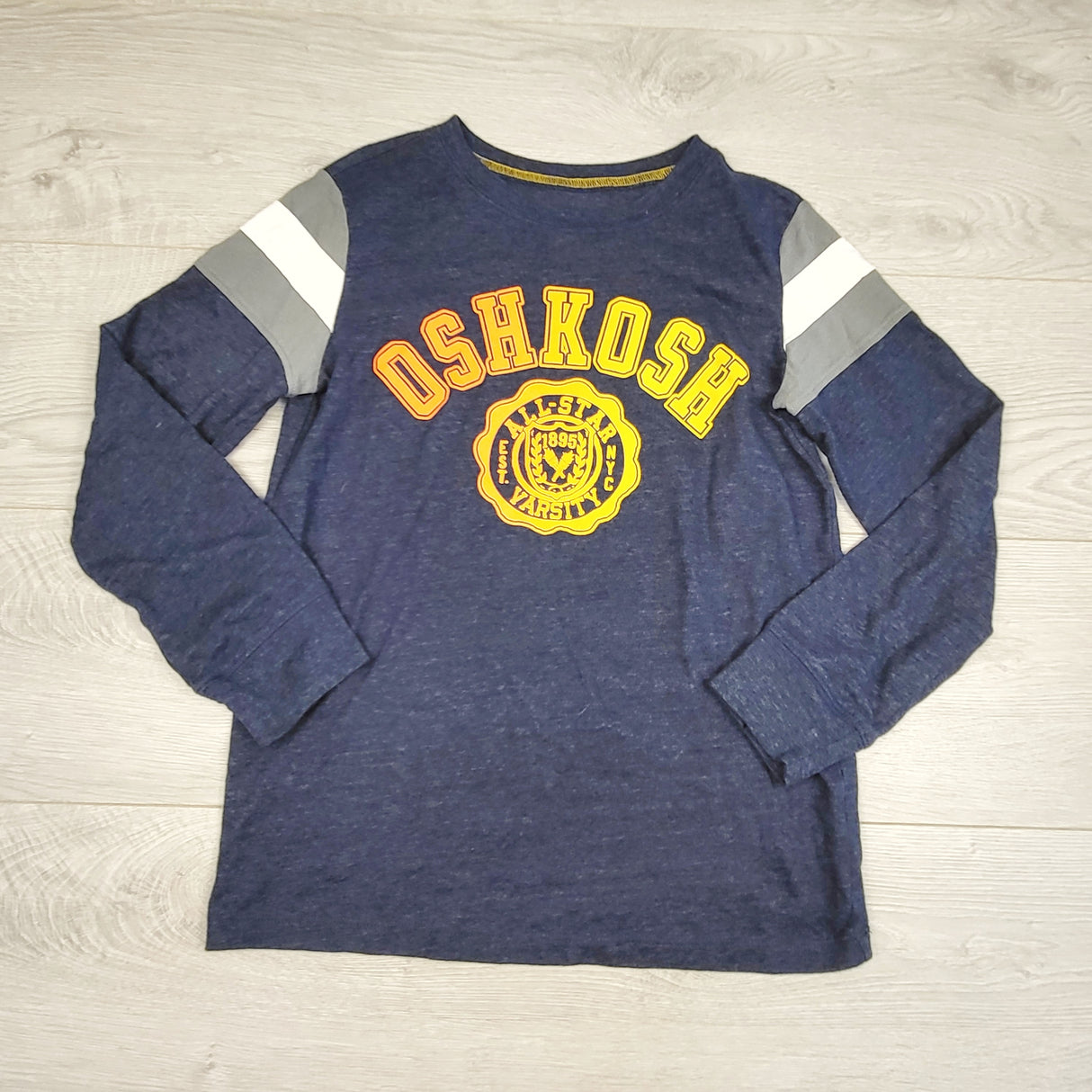 PS03 - Oshkosh blue logo long sleeved top. Size 10