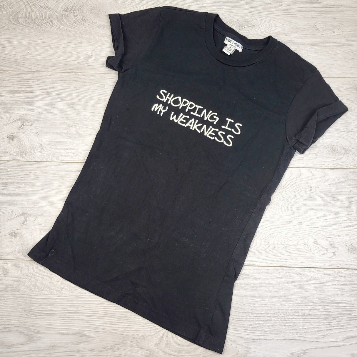 MBRS2 - Steve and Barry's black "Shopping is My Weakness" t-shirt. Size medium