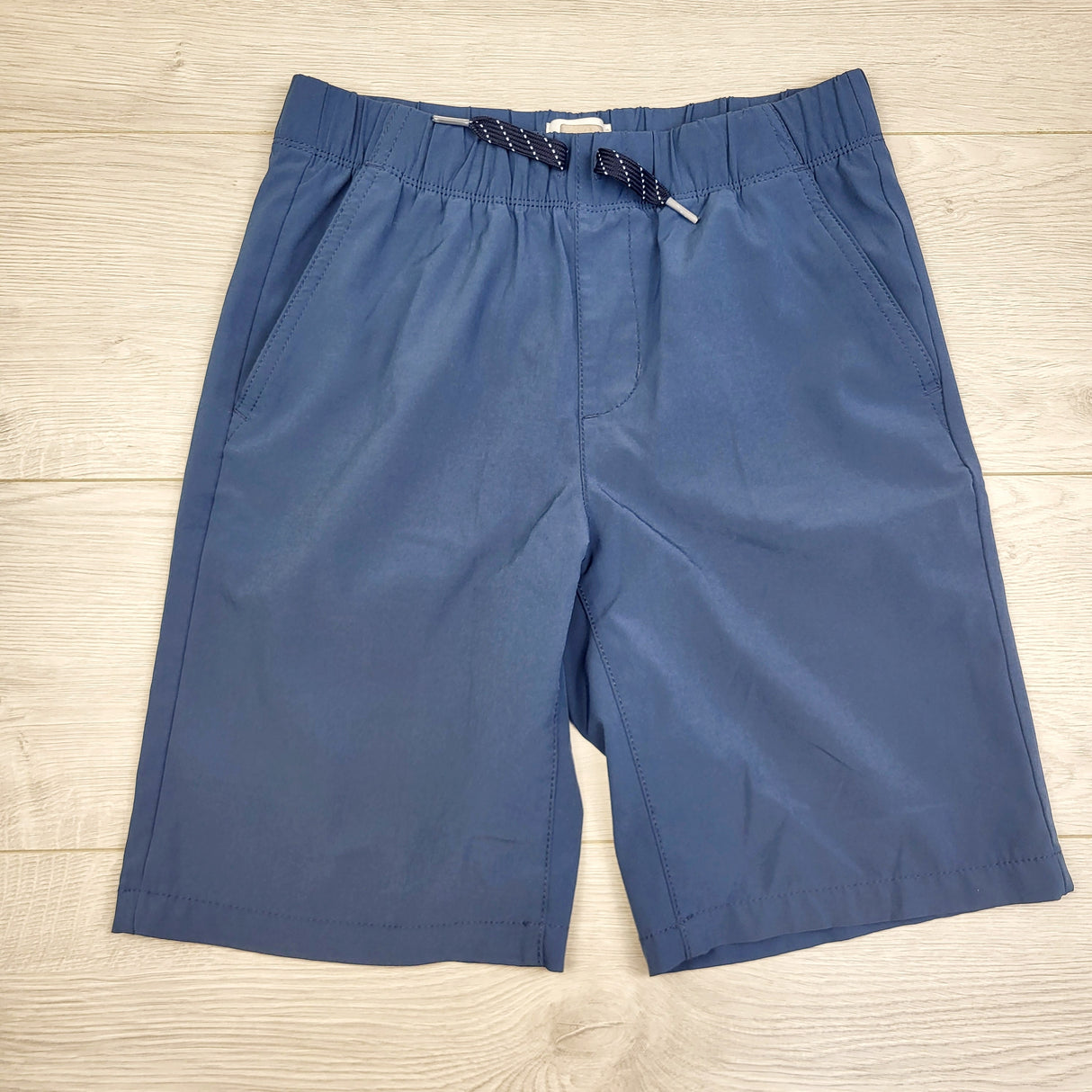 MBRS22 - Old Navy blue drawstring board shorts. Size 10/12