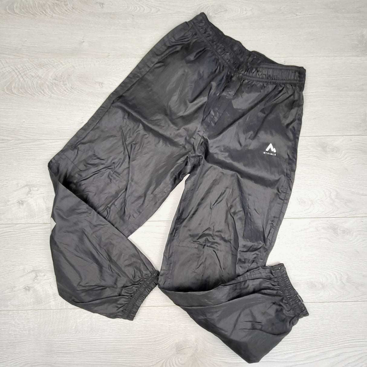 JUDM1 - McKinley black rain pants. Size 10
