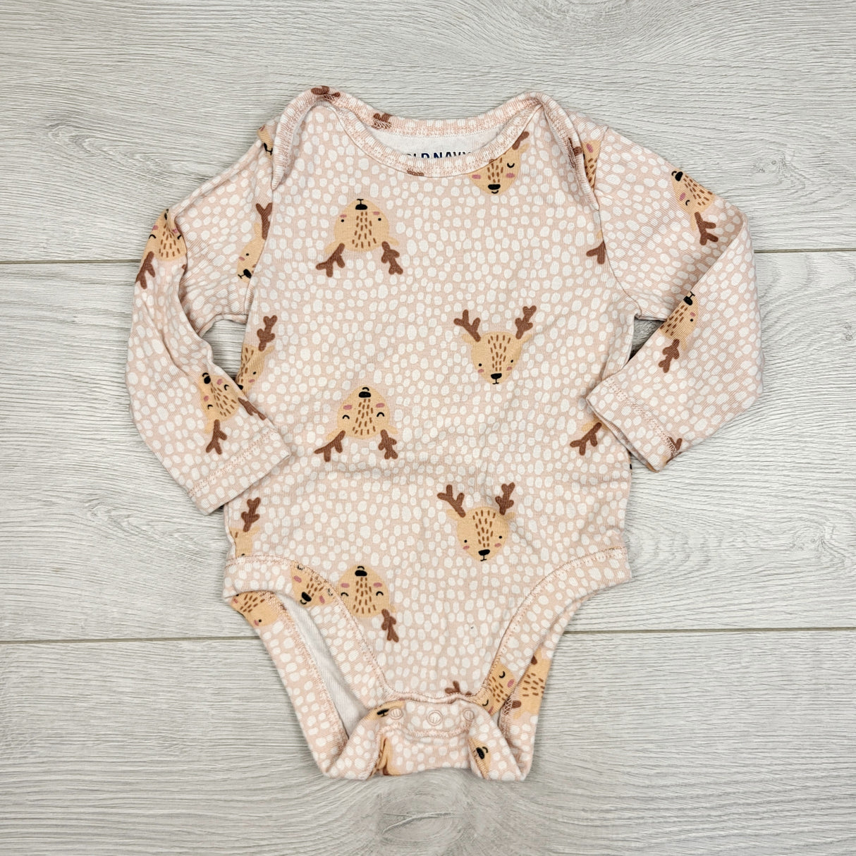 JRSH1 - Old Navy pink dotted bodysuit with reindeer. Size 3-6 months