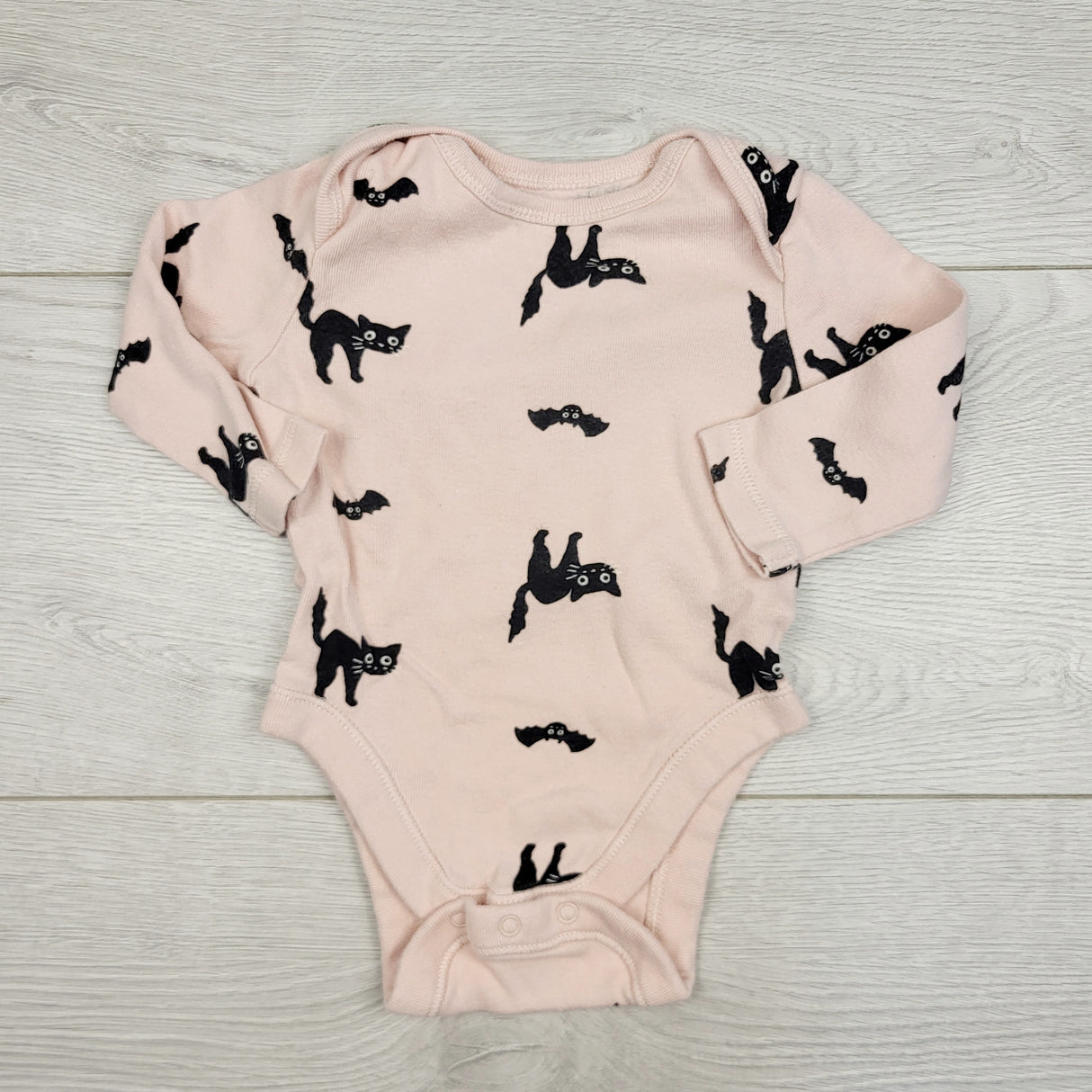 JRSH1 - Old Navy pink bodysuit with black cats. Size 0-3 months