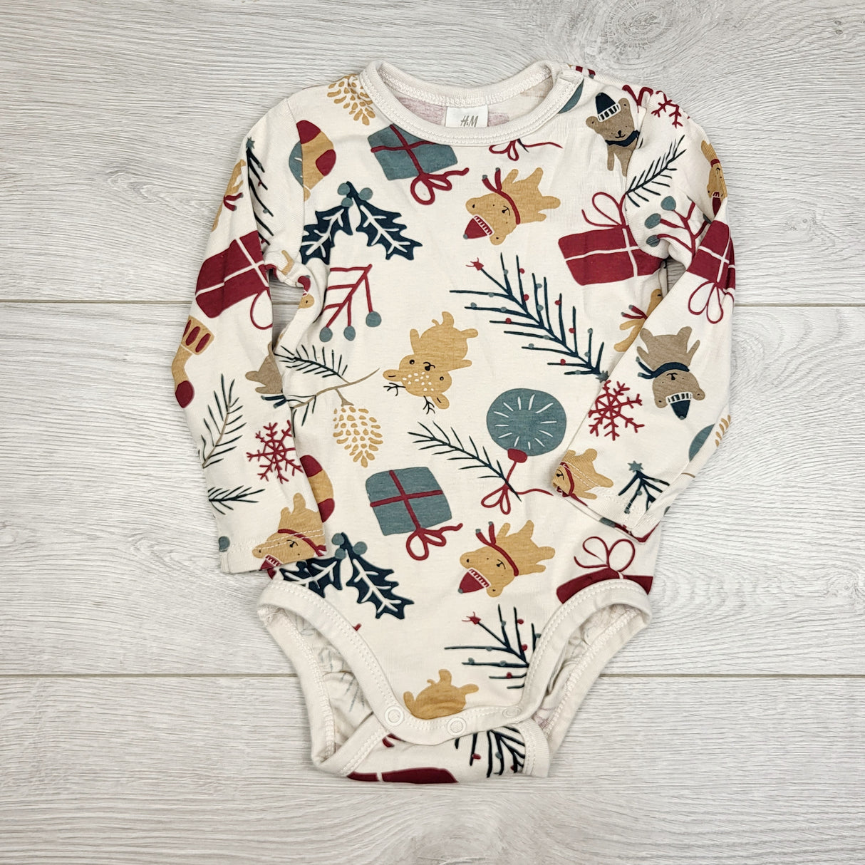 JRSH1 - H and M holiday themed bodysuit. Size 6-9 months