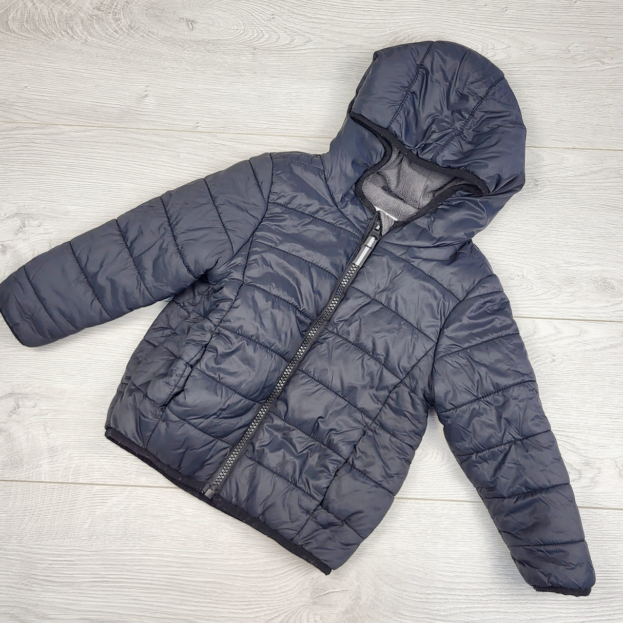 JRSH1 - Cat and Jack black fleece lined puffer jacket. Size 2T