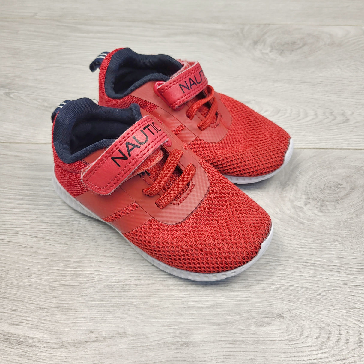 ROWB1 - Nautica red running shoes. Size 7