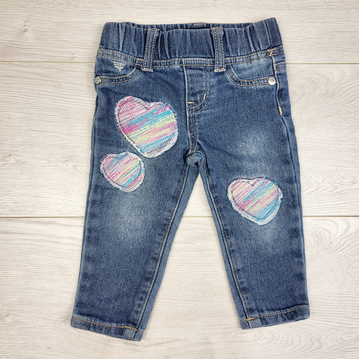 STML1 - Guess skinny jeans with embroidered hearts. Size 12 months