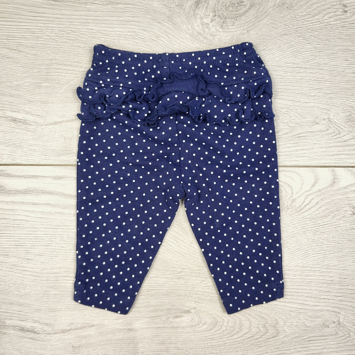 STML22 - Child of Mine navy polak dot leggings with ruffle bum. Size Newborn