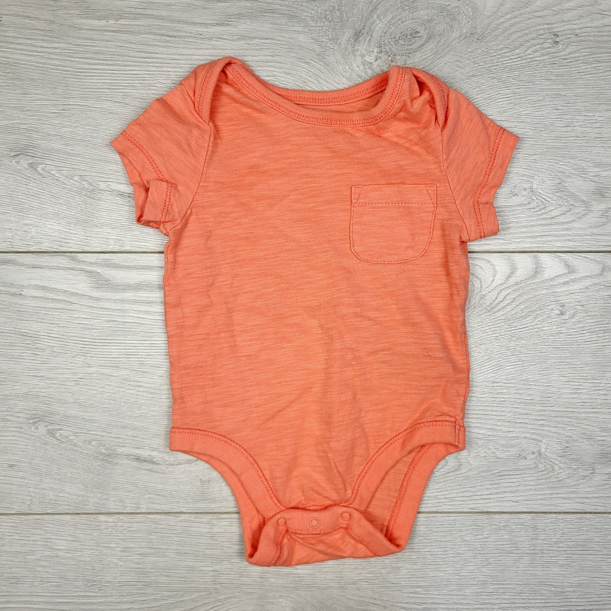 STML22 - Old Navy coral bodysuit. Size 3-6 months