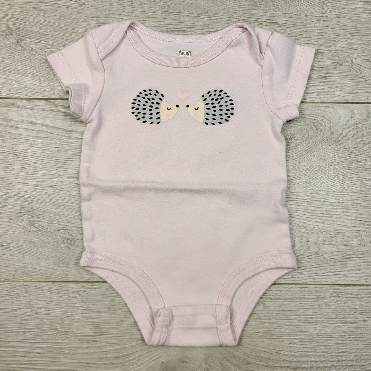 COHI2 - Rococo pink bodysuit with hedgehogs. Size 6 months