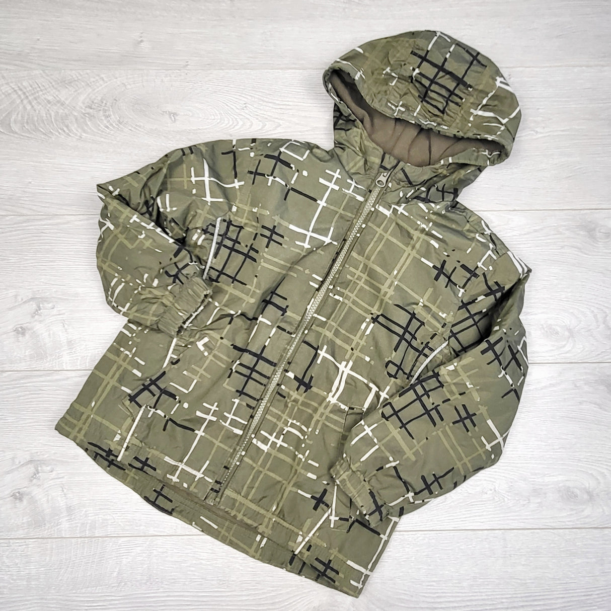 CBRD2- Westbound green patterned fleece lined hooded rain jacket. Size 5T