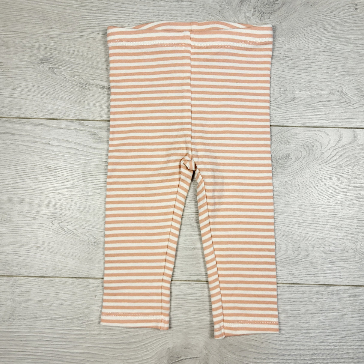 BBIN1 - Pekkle pink striped leggings. Size 9 months