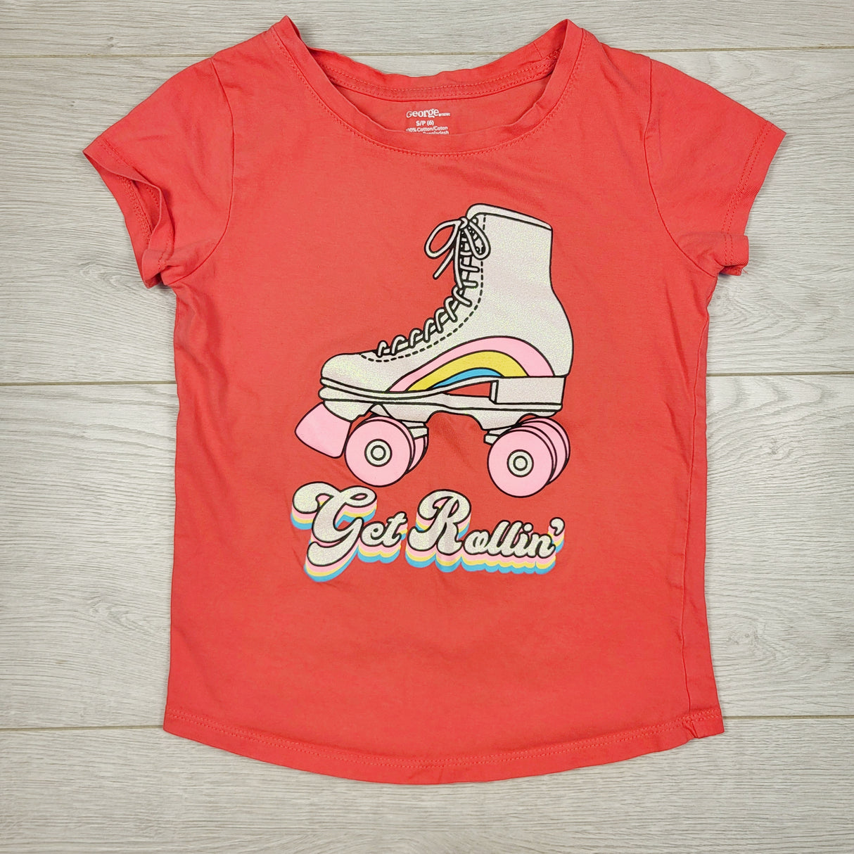 TBRG2 - George pink t-shirt with rollerskate. Size 6