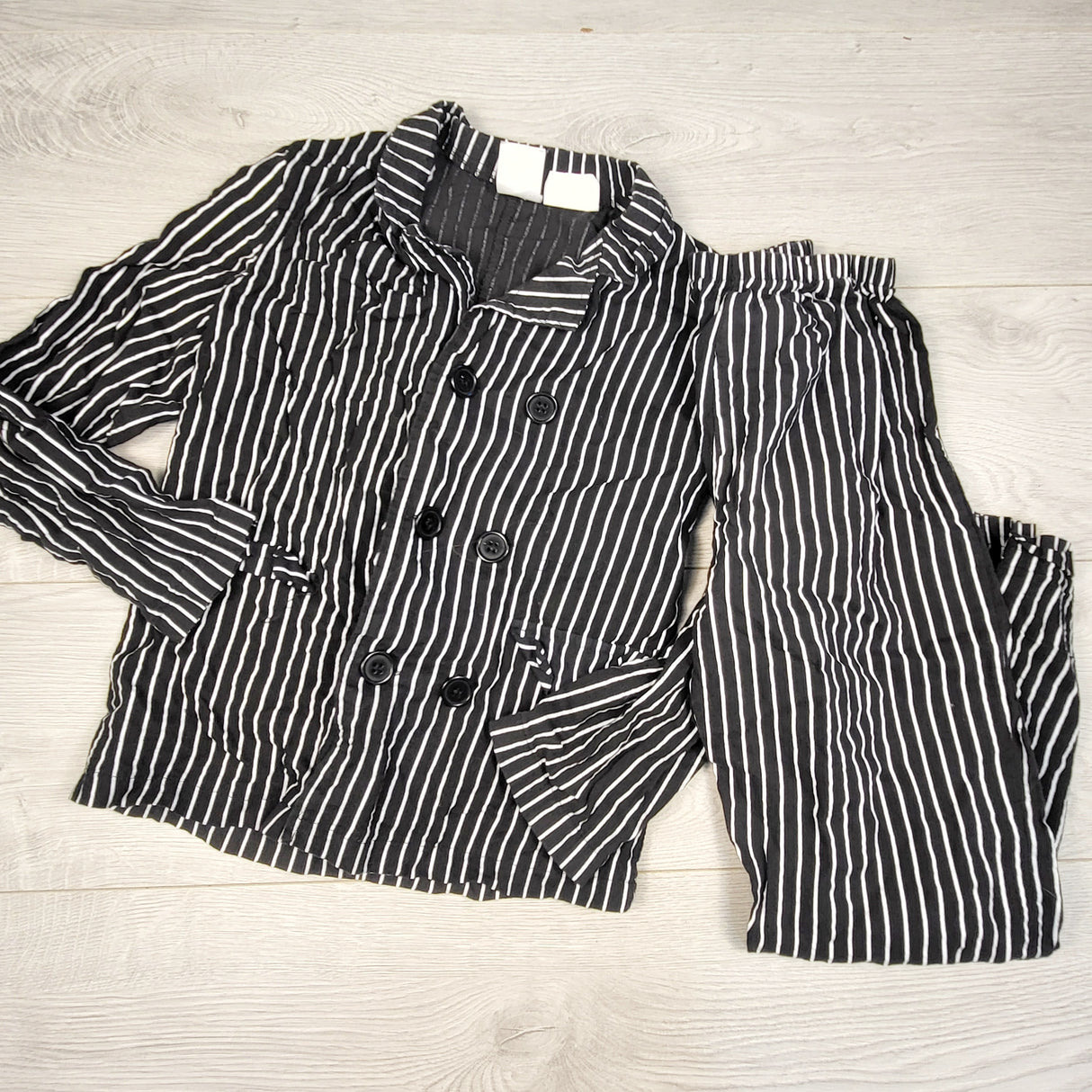 PS3 - The Nightmare Before Christmas striped Jack Skellinton 2pc suit. Says 8 to 10 years but looks like 6-8 Years