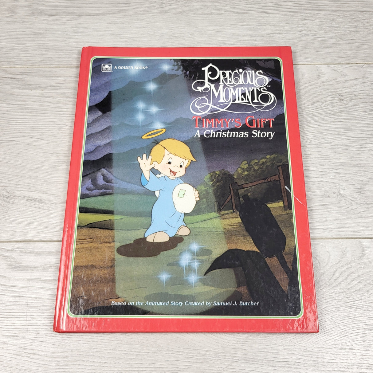 ESZ3 - Timmy's Gift: A Christma Story. Hardcover book