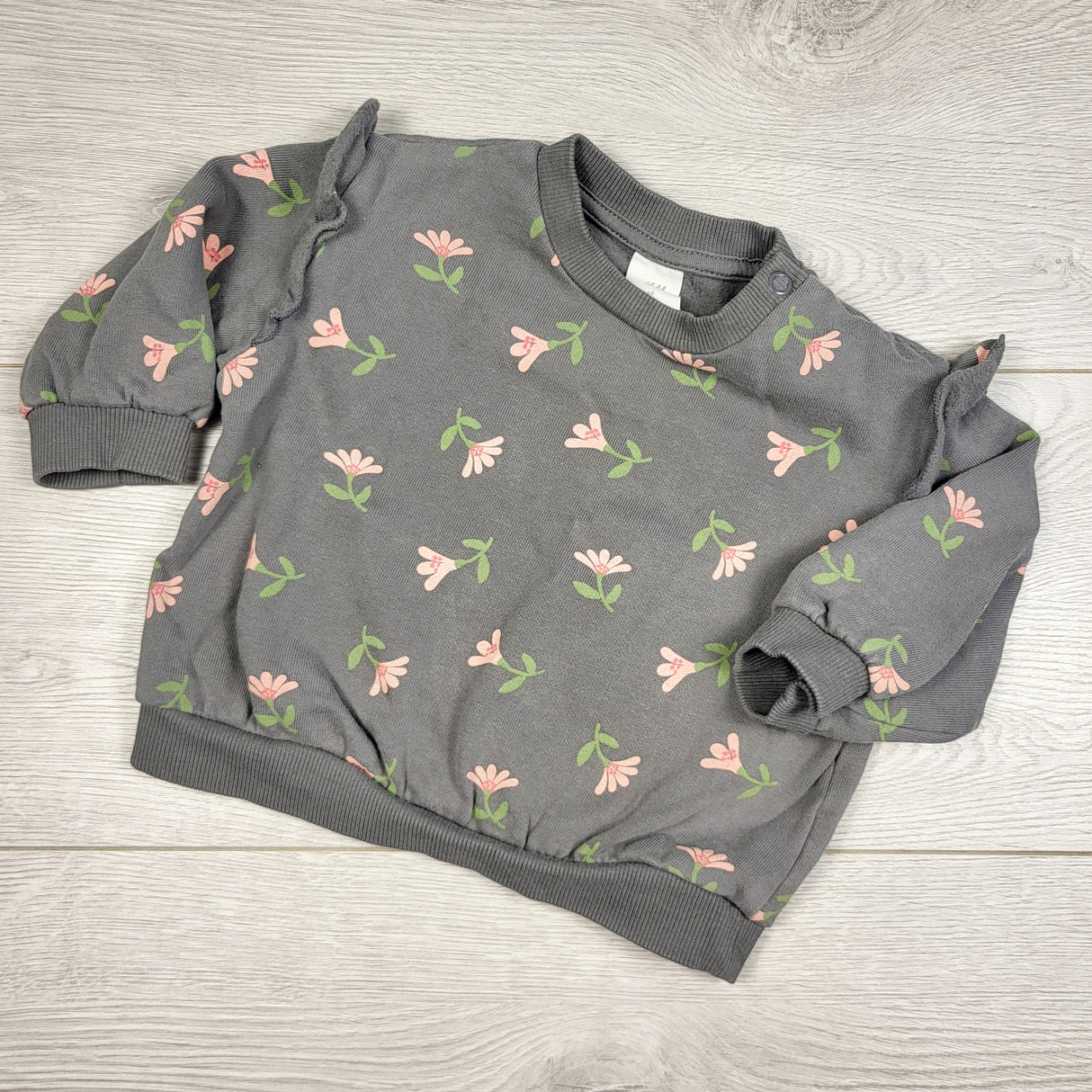 STHA1 - H and M grey sweatshirt with flowers. Size 4-6 months
