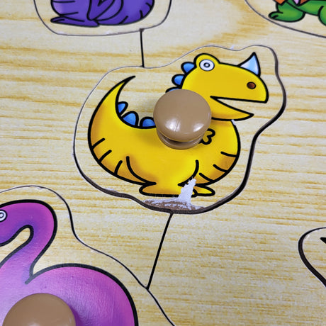 LKAN1 - Wooden peg puzzle with dinosaurs