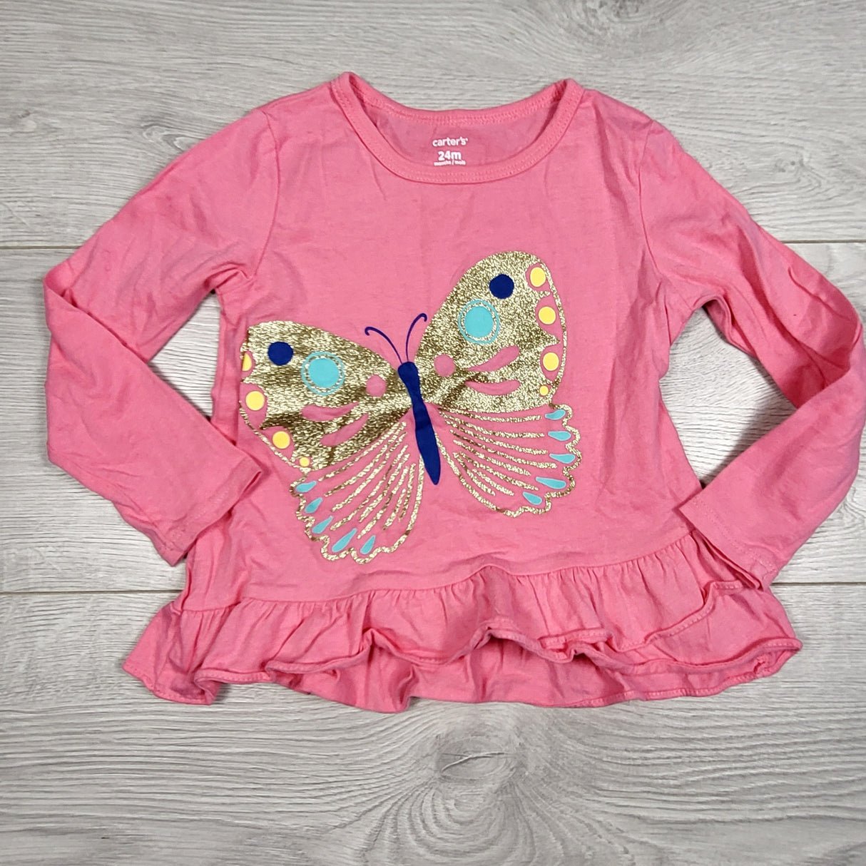 TSTB11 - Carters pink long sleeved top with butterfly. Size 24 months