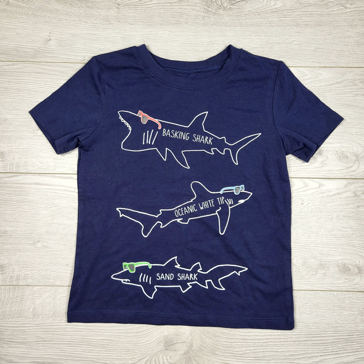 TGSS1 - Andy and Evan navy t-shirt with sharks. Size 6