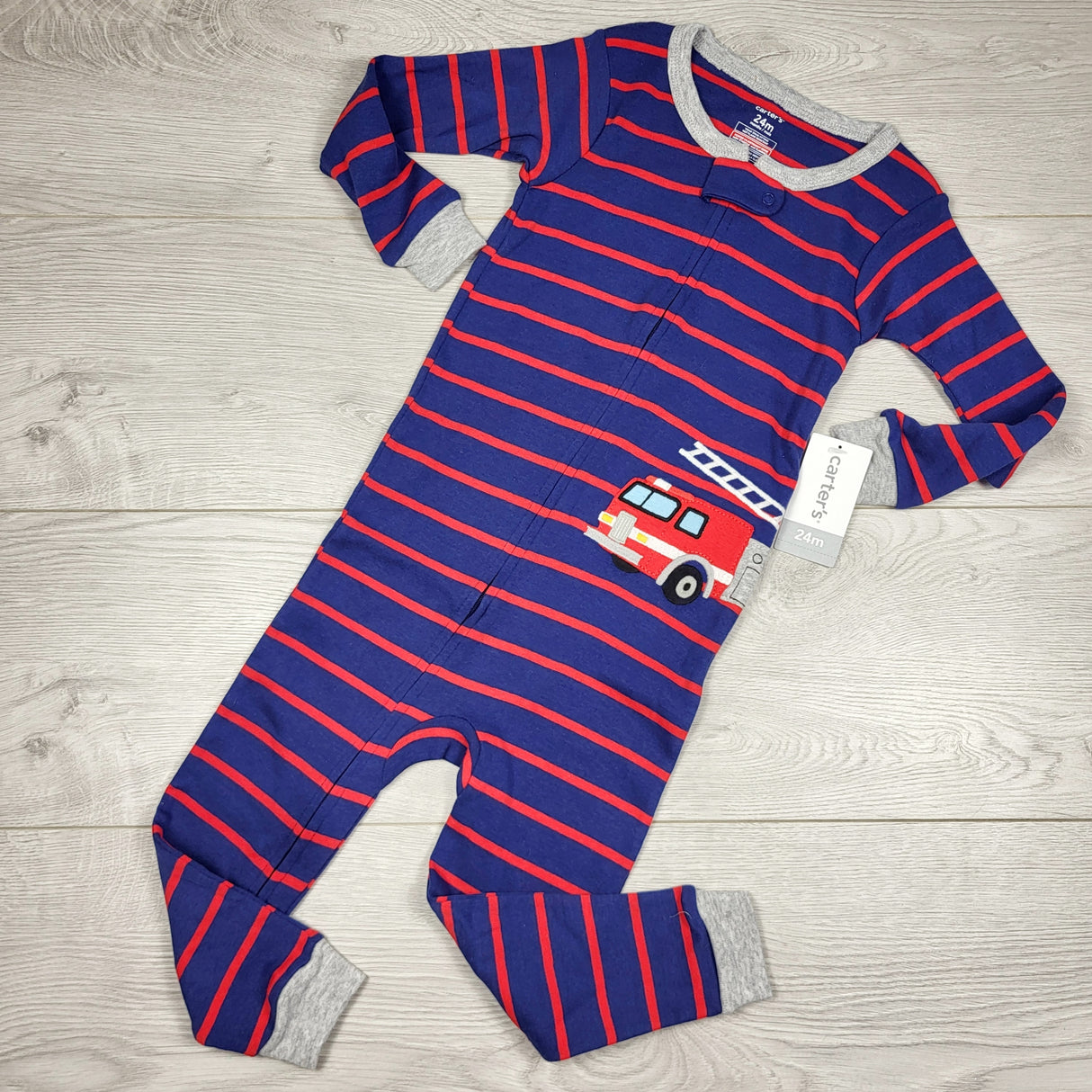 KAMG1 - NEW - Carters navy and red striped zippered cotton sleeper with fire truck. Size 24 months