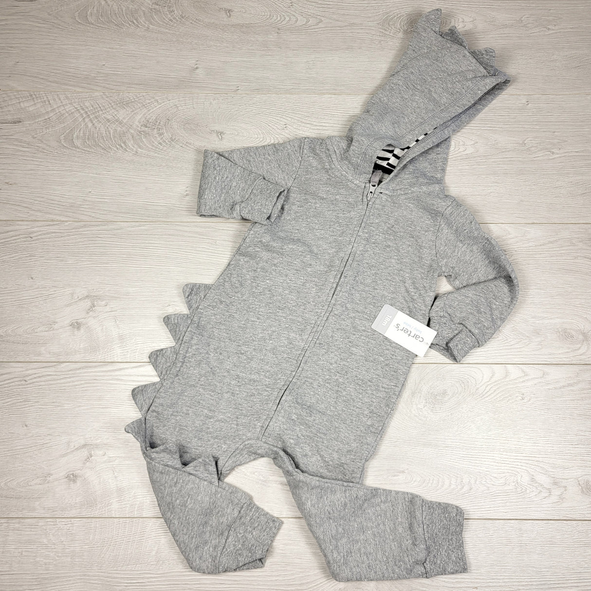 KAMG1 - NEW - Carters grey hooded playsuit with scales. Size 18 months