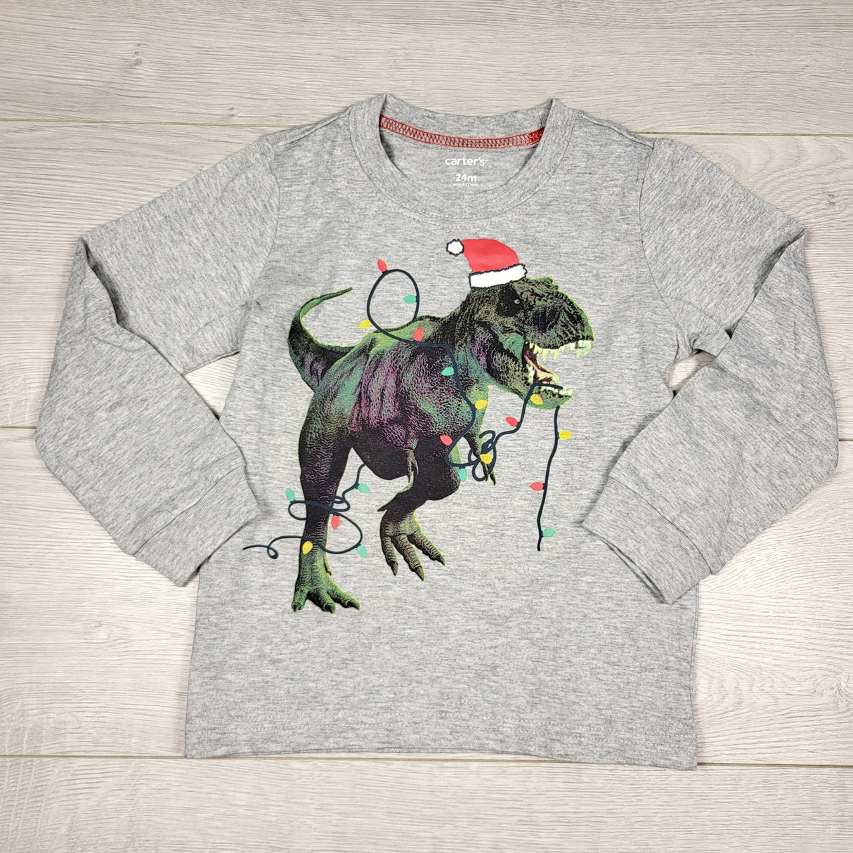 KAMG1 - Carters grey long sleeved top with Christmas T-Rex. Size 24 months