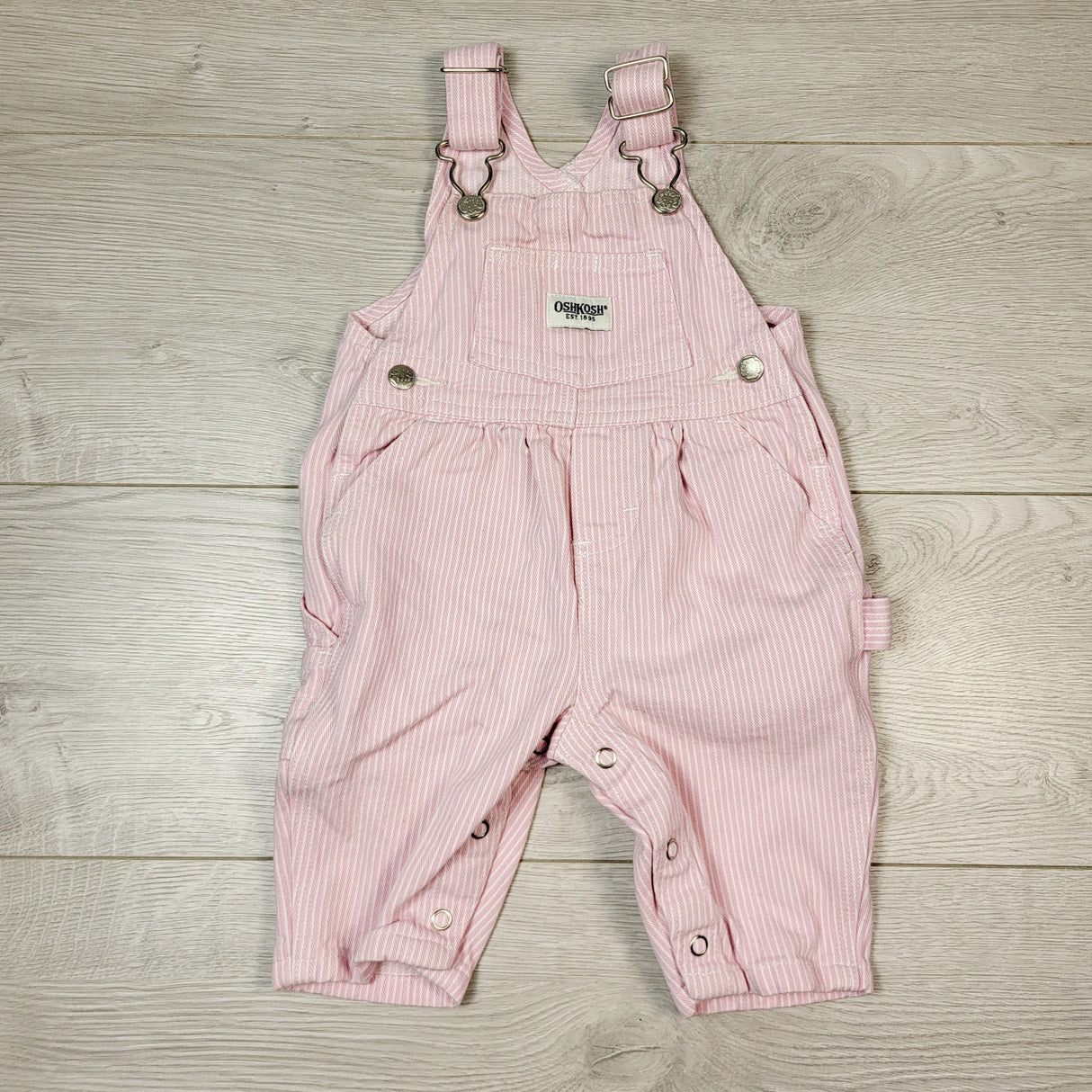DMKY2 - Oshkosh pink striped denim overalls. Size 3-6 months
