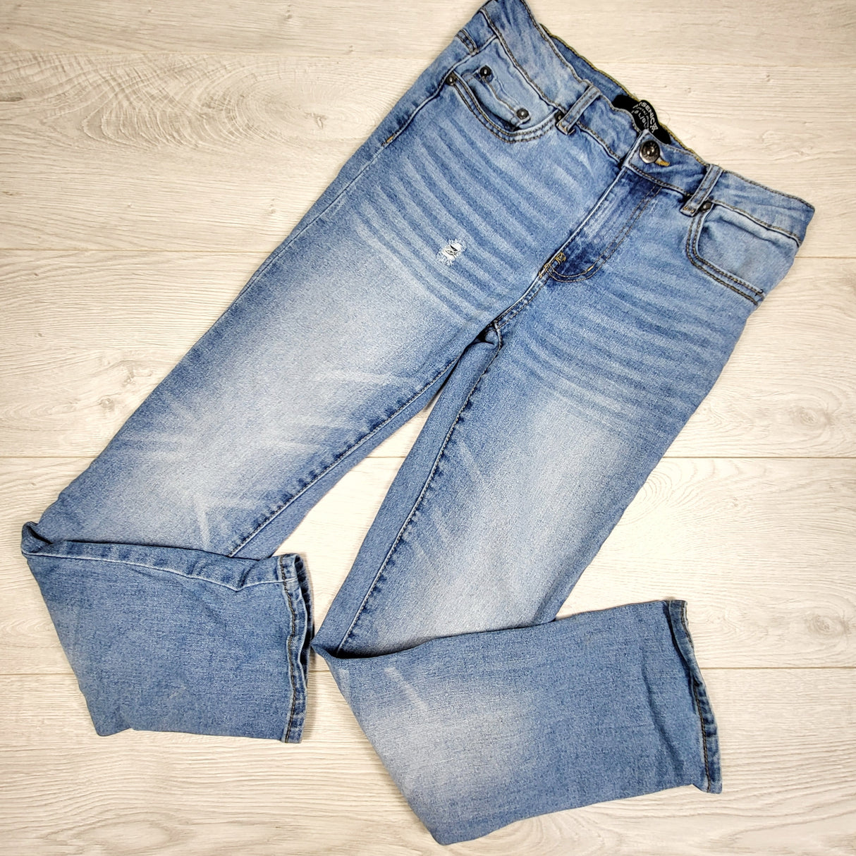PS04 - Arsenic distressed blue jeans. Size 14