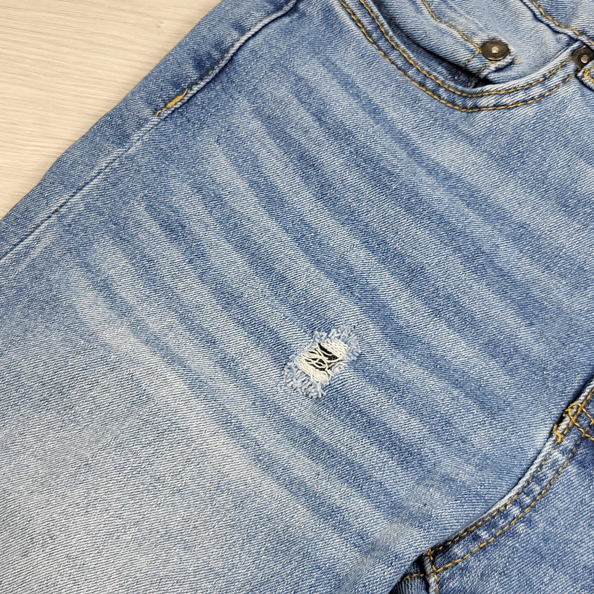 PS04 - Arsenic distressed blue jeans. Size 14