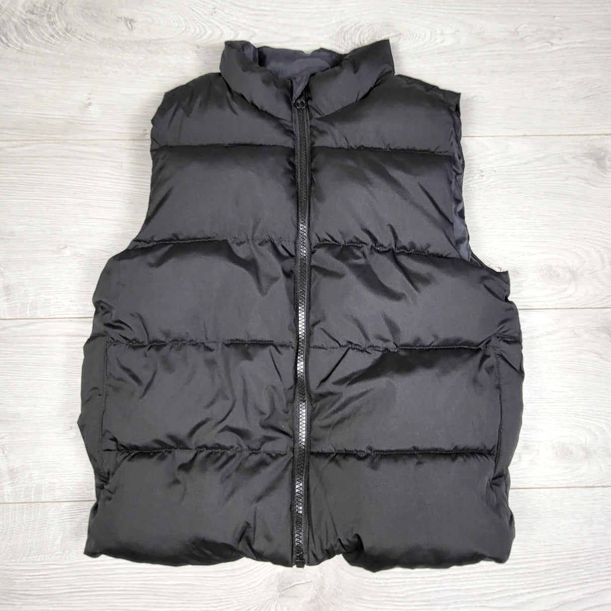 MBW3 - Old Navy black fleece lined water resistant puffer vest. Size 6/7