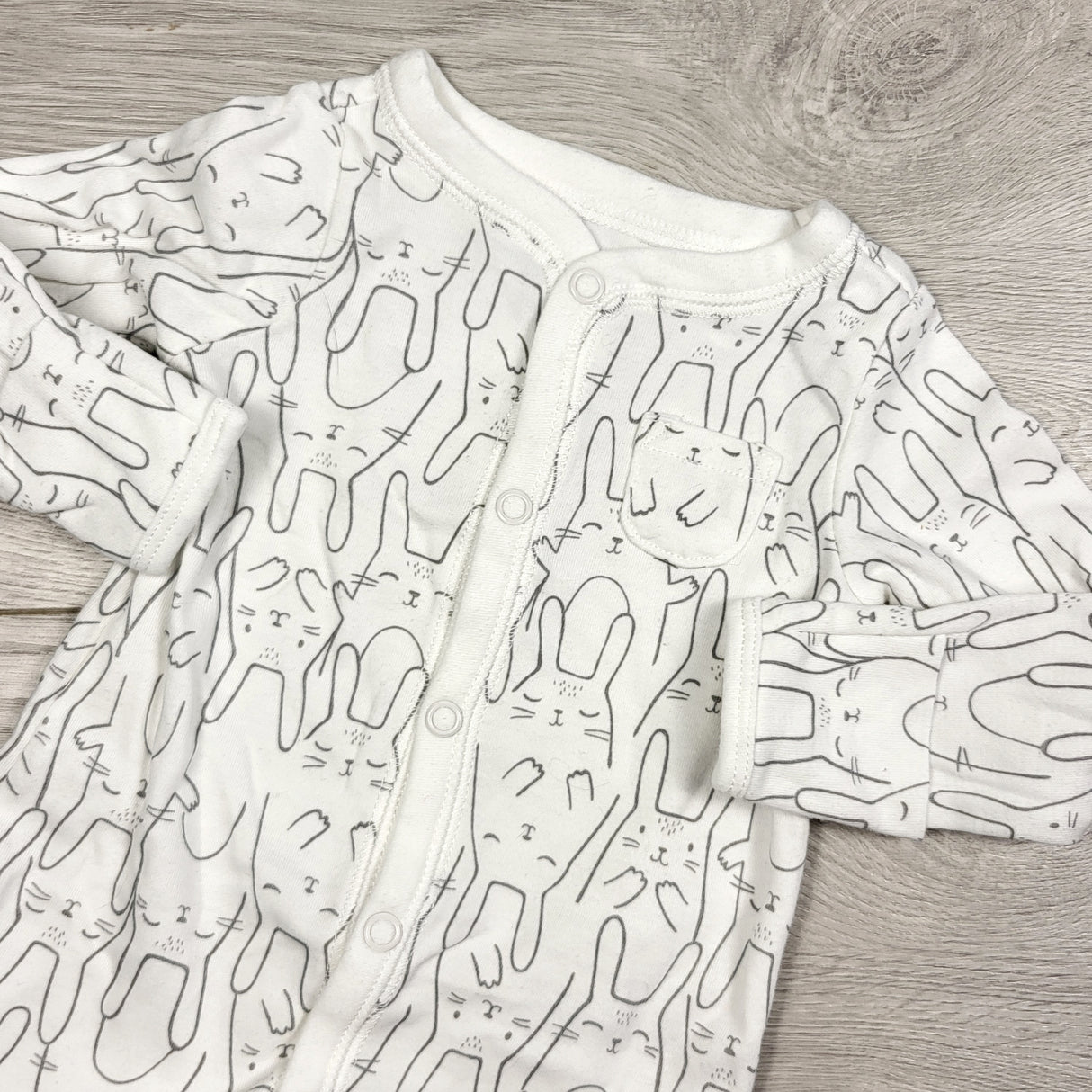 KAMG2 - Carters white cotton sleeper with bunnies. Newborn size
