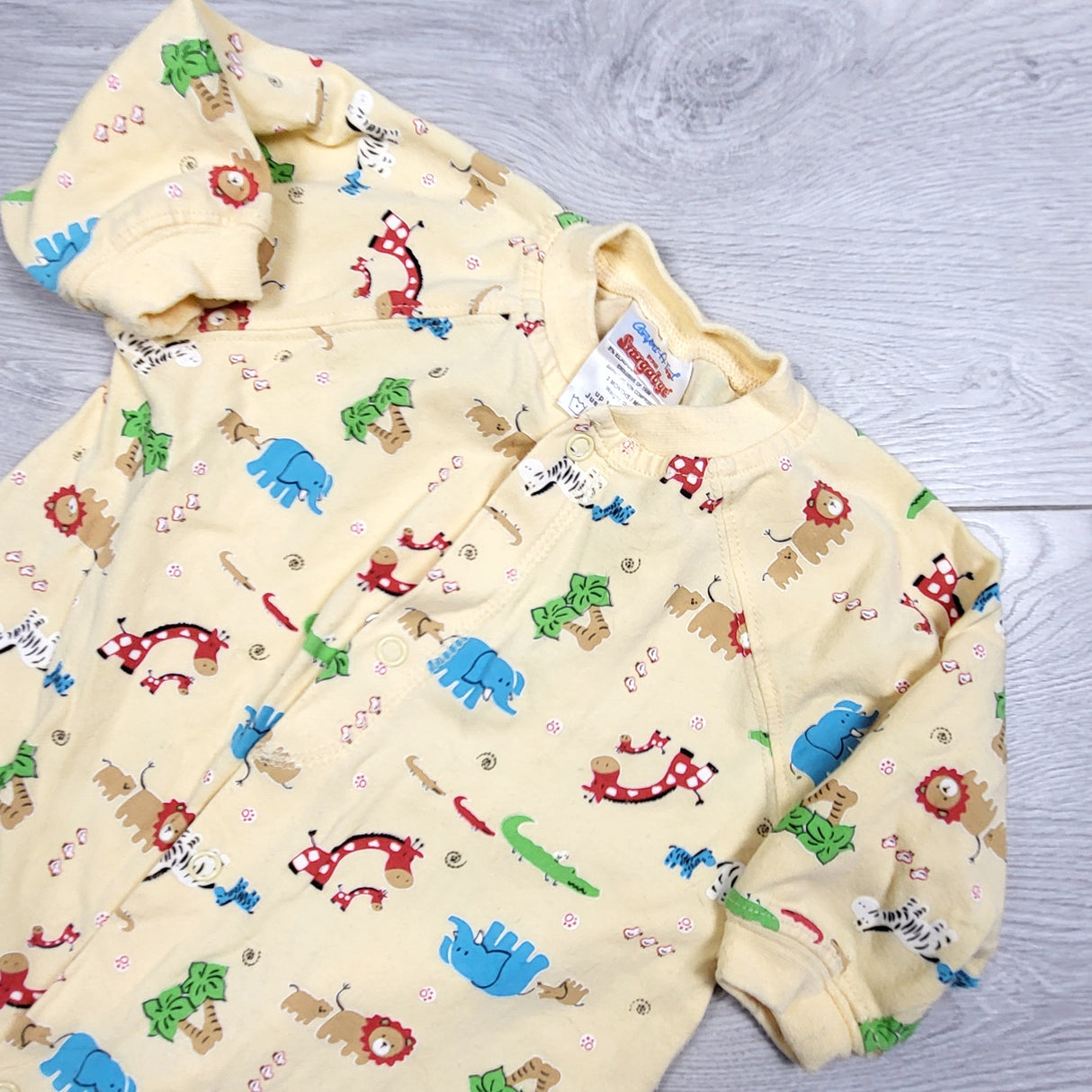 KAMG2 - Snugabye yellow Convert-A-Foot sleeper with safari animals. Size 3 months