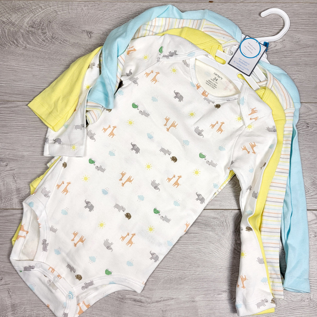 KAMG3 - NEW - Carters 4pc long sleeved bodysuit set with safari animals. Size 24 months