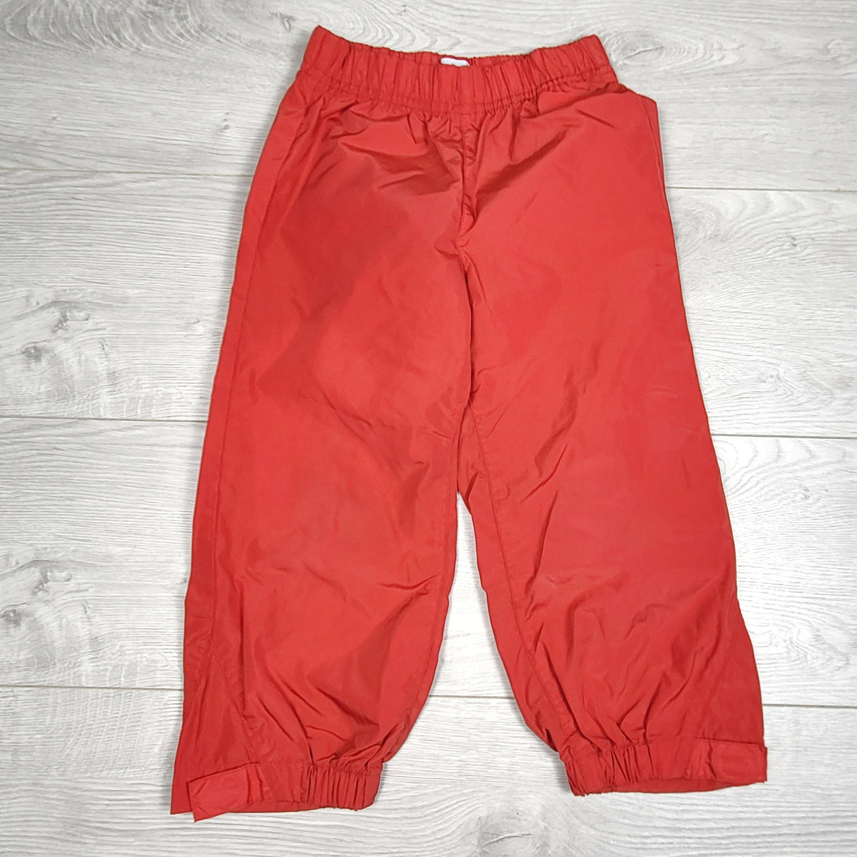 LUGE1 - Old Navy red rain pants. Size 3T