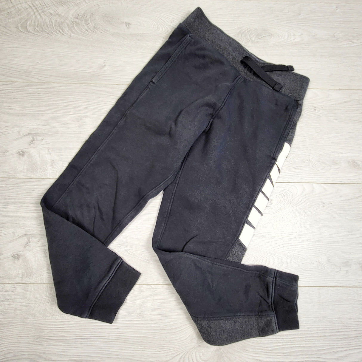 KHW1 - Nike charcoal fleecy lined joggers. Size XS