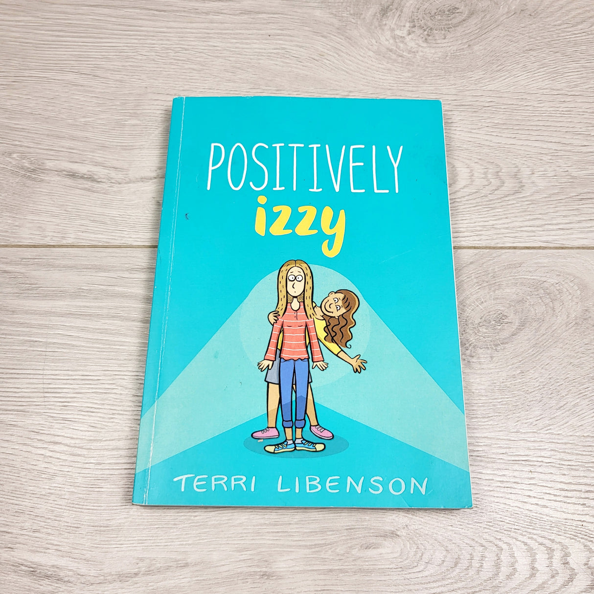 KHW1 - Positively Izzy. Soft cover book
